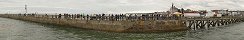 Crowd on the East Pier in Grandcamp-Maisy (Calvados, France)